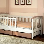 children's bed with sides in the nursery