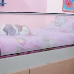children's bed with a side