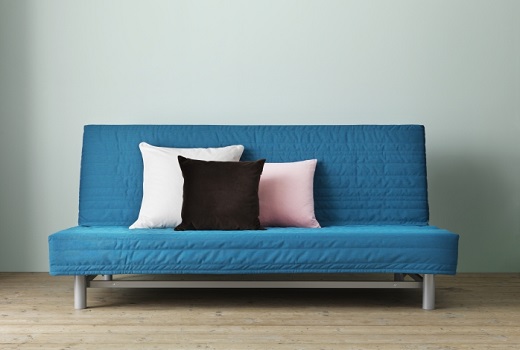 sofa bed and multi-colored pillows