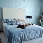 double bed in blue interior