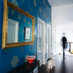 mirror in the blue hallway