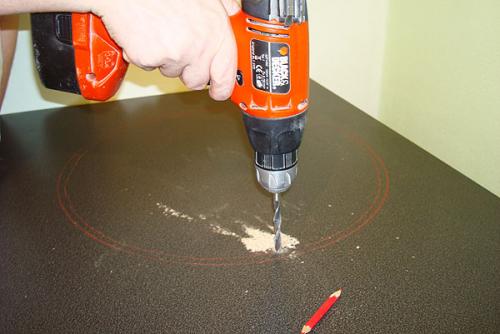 drill a hole in the tabletop