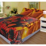 Baby bedspread on the bed Spiderman