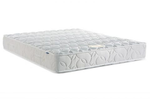 Double bed with white mattress