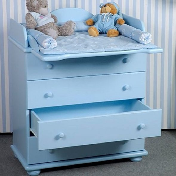 Dresser for a nursery with a folding table