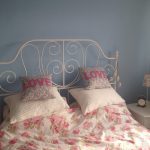 Stylish white wrought bed