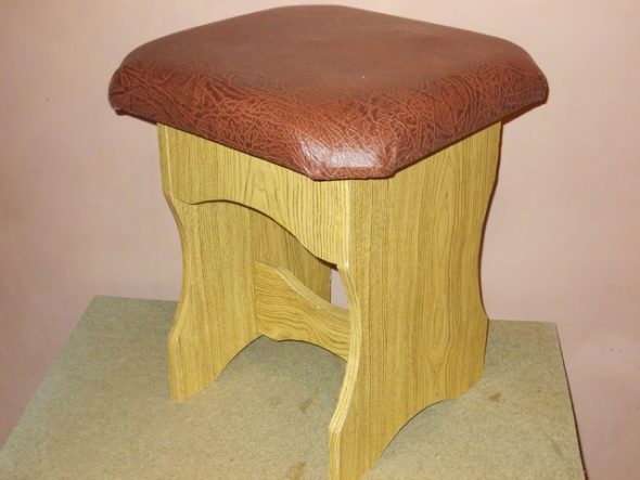 Chipboard stool with leather upholstery