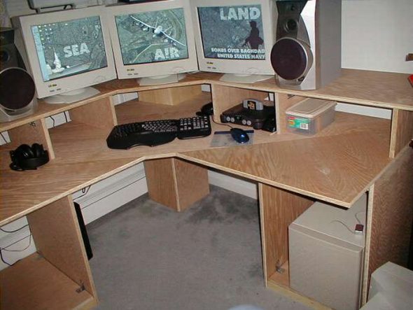 a large computer desk with their own hands