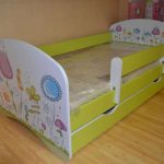 children's bed with a removable protective side