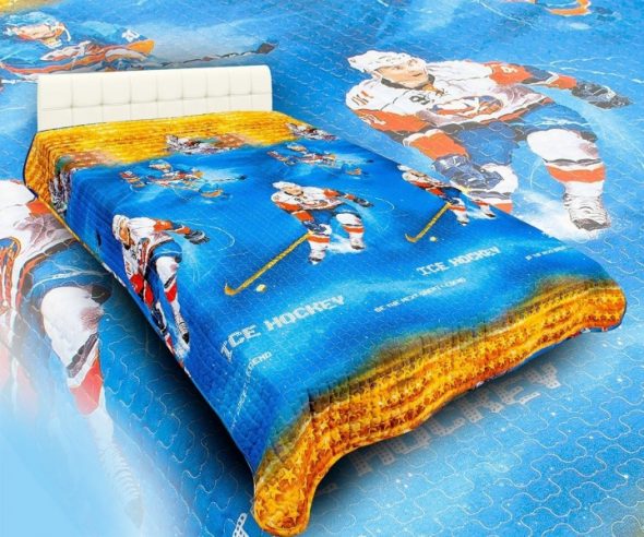 baby bedspread on the bed hockey