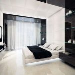 bed in black and white bedroom