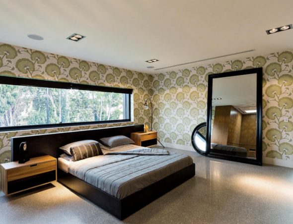 bedroom with large mirror