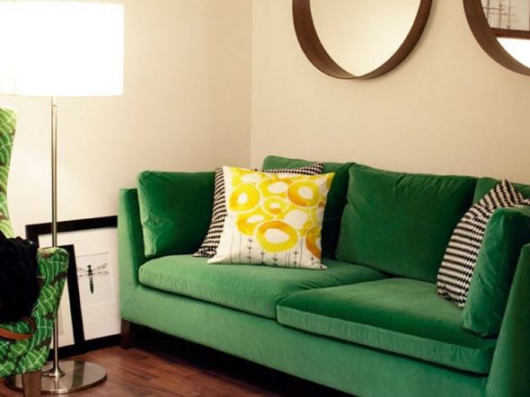 green sofa in the interior of the house