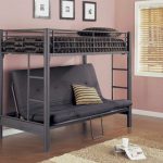 Bunk metal bed with a sofa photo