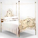 Forged Bed with a canopy photo