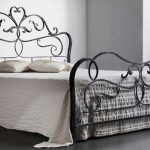 Luxury double bed with wrought-iron backrest