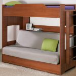 bunk wooden bed with sofa