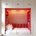 bed and storage in a niche