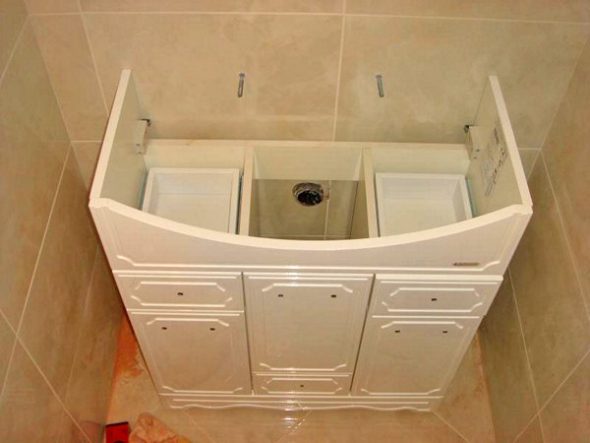 installation of the washbasin on the cabinet