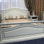 Double bed made of solid wood! in the interior of the bedroom