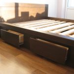 Double bed with drawers on telescopic slides