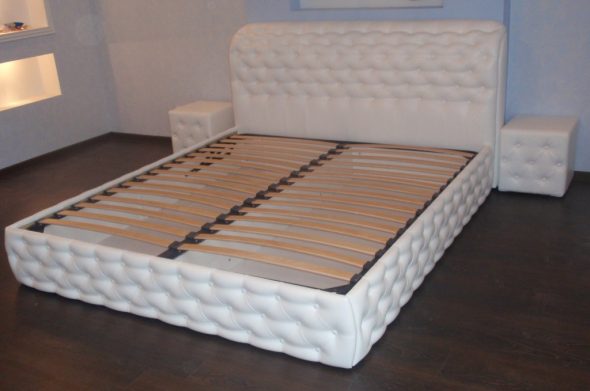 Leather-covered bed frame