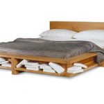 Bed made of solid wood photo