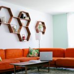 Honeycomb shelves above the sofa in the living room