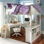 bunk bed with a table for a girl