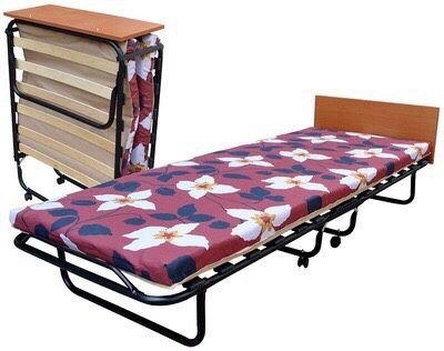 folding bed with a mattress on the belts