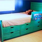 Bed with drawers for storing household items