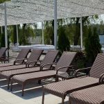 Garden rattan furniture is quite popular not only in public places.