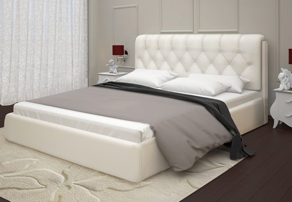 białe skórzane łóżko
