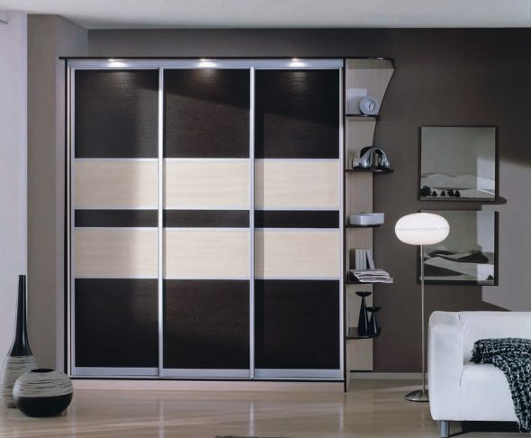 Black and white wardrobe with upper lighting