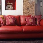 Decorative pillows for a red sofa