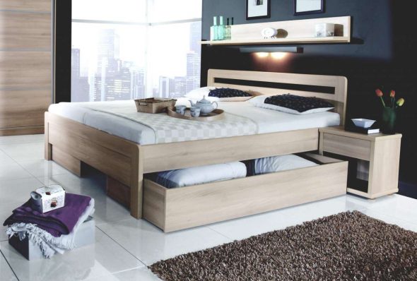 wooden bed with storage boxes