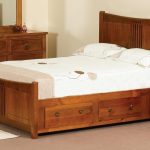 wooden bed with storage boxes photo design