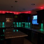 The use of light of different colors in the interior of the kitchen