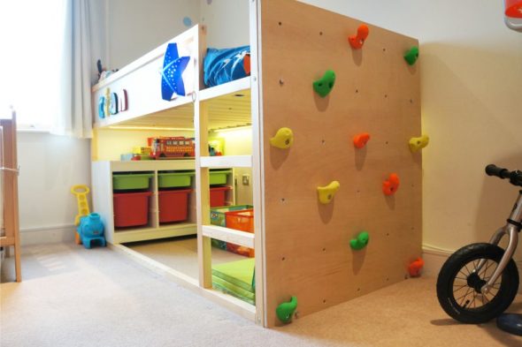 Loft bed with play area and climbing wall