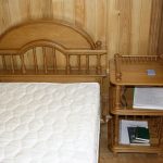 Bed with an oak bookcase
