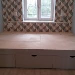 Bed with drawers for a small room