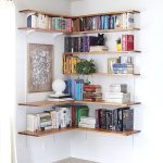 A small home library in the corner of the room