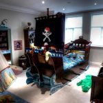 Pirate nursery with sleeping, play and work areas