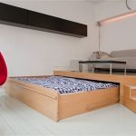 Podium med soffa och utgångs säng för vardagsrum