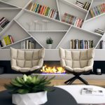Unusual shelves for decoration and books above the fireplace