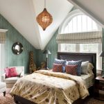 Bedroom in the attic provides for the installation of a bed with a headboard to the window