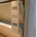 Naka-istilong at praktikal na solusyon sa anyo ng isang bunk bed