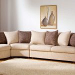 Corner sofa with pillows in two colors