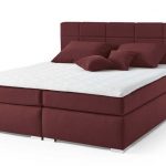 The option of a beautiful bed with a soft burgundy back