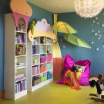 Bright shelf for books and toys in the nursery
